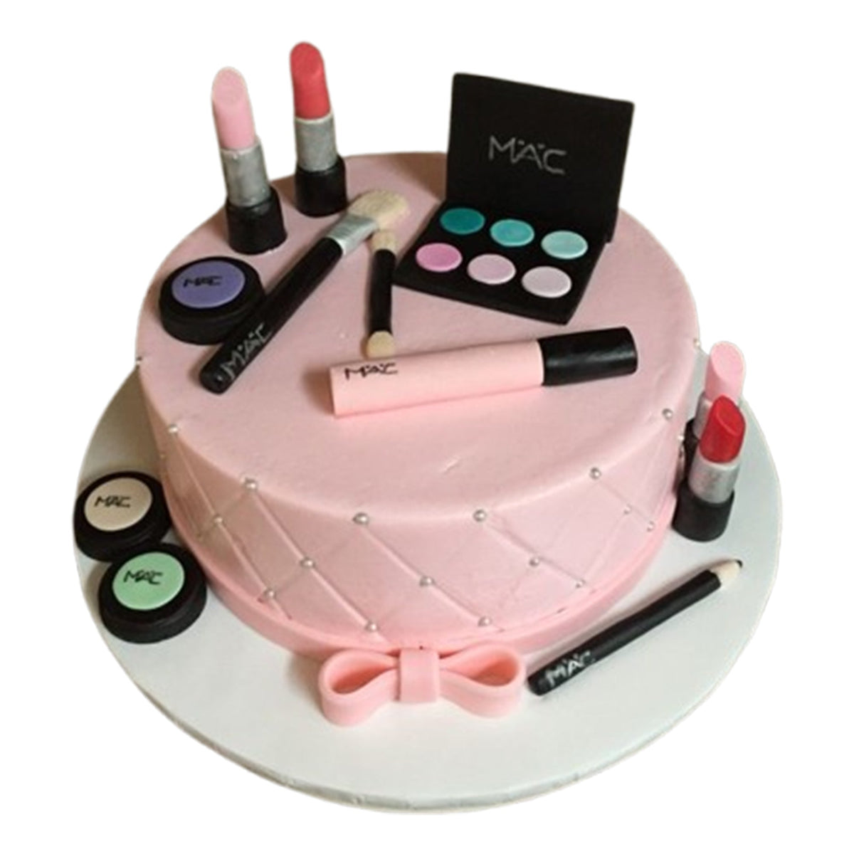Realistic fondant lipstick tube with edible tip adorning a glamorous makeup-themed cake