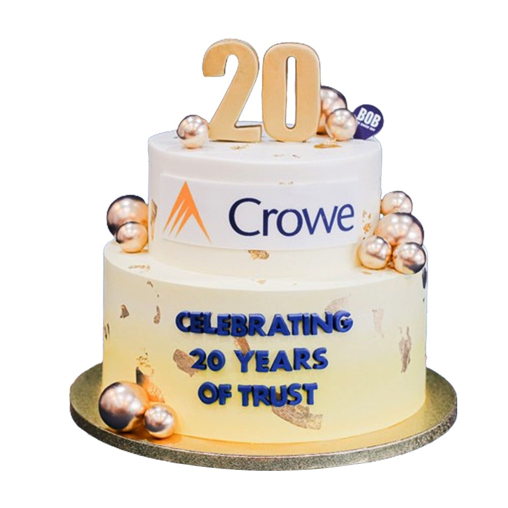 “Corporate celebration cake with elegant layers and candles for team success”