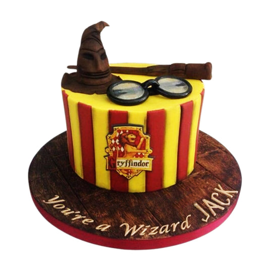 Cauldron-shaped Harry Potter cake with bubbling potion effect made from isomalt and cotton candy

